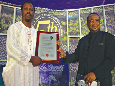 Akpovi-Esade (left) and COSON boss Okoroji