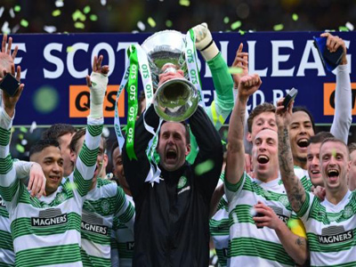 Ronny Deila won his first trophy as Celtic manager as the Hoops beat 10-man Dundee United 2-0 in the Scottish League Cup final. PHOTO: talksport.com